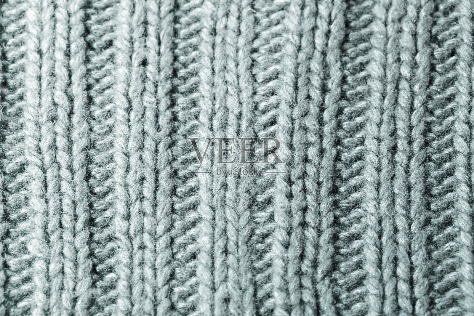 綠色羅紋或纜線針編織毛織背景照片攝影圖片